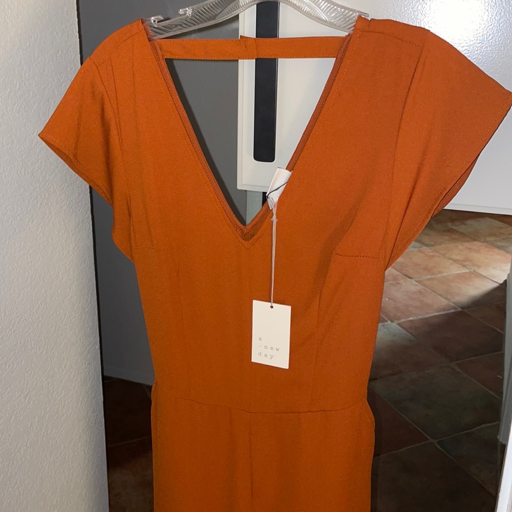 New with tags rust colored jumpsuit